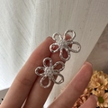 Elegant S925 silver hollow flower stud earrings with shimmering zircon center stone - 925 Silver / Hollow Flower Earrings(EHL039)