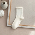 Elegant off-white cotton blend crew socks with ruffled edges and ribbed texture for women - One Size / Milk White