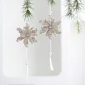 Champagne glitter snowflake ornament with white pearls and long tassels hanging on tree - Tassel Flower 2pcs Set