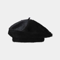 Primer plano de la textura de piel de conejo de esta clásica boina negra de invierno - Talla única / Negro