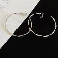 Silver twisted geometric circle clip-on earrings with wavy design for non-pierced ears - 6cm / Silver