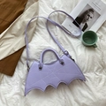 Detail of purple bat-shaped PU leather handbag with embroidered spider web patterns - One Size / Violet