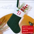 Dark green knitted Christmas stocking with white cuff and red embroidered letter B - Letter B / Dark Green