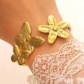 Golden open bangle featuring carved butterflies and flower with brushed metal finish - Butterfly Flower Brushed (K-427)