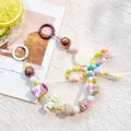 Detail of candy color beaded phone strap with mini croissant and donut charms - M Round Tag / Coffee