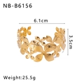 Detailed macro view of the open cuff bracelet featuring golden hollowed floral patterns - Hollow Floral Style (NB-B6156)
