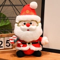 Simpatico peluche Babbo Natale con occhiali dorati e bastoncino di zucchero natalizio - Stile Bastoncino di Zucchero