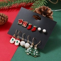 Close-up of a 6-pair Christmas earring set with reindeer, Santa, and festive bell designs - 6 Pairs/Set Glove Red Shoe House Tree