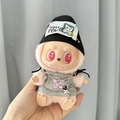 Pink plush doll clothes set featuring a black knit beanie and grey graphic t-shirt - Hip Hop Girl / First And Second Generation Keychains Are Compatible With La Cloth Dolls. Dolls Not Included.