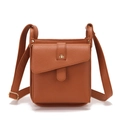 Detail of brown litchi pattern leather crossbody phone bag with gold metal rivet studs - Brown