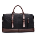Black canvas travel bag with brown leather trim and dual handles for business trips - Black