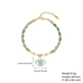 Bracciale occhio greco con perline quadrate verdi e accenti dorati su sfondo bianco - Verde Scuro/Occhio Blu e Bianco