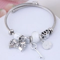 Silver tree of life charm bracelet with crystal bow and key pendants for women - White