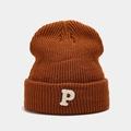 Detail shot of caramel knit beanie showing the premium white letter P embroidery - Caramel color
