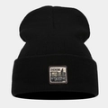 Detailed view of black knit beanie featuring vintage style woven denim supply patch - M (56-58cm) / Black