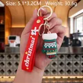 Green PVC Christmas glove keychain with red strap and white 'christmas' logo lettering - Christmas Glove-1