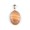 Oval natural agate pendant with beige and orange layers in a golden metal frame - Jasper