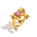 18K gold plated bow ring featuring a pink heart-shaped gemstone and polished finish - US 6 / Gold