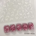 White bow nail art sticker YO-007 on pink cat-eye manicure with rhinestones - YO-007 White