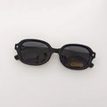 Foldable black oval polarized sunglasses with silver metal hinges and UV protection - Black