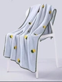 Close-up of coral fleece towel with yellow pineapple embroidery on a modern white chair - 35×75cm / Grey (Pineapple)