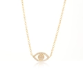 Close-up of gold-plated evil eye necklace featuring sparkling pave-set zircon stones - Evil Eye / Gold