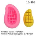 Pink silicone mango mold with yellow soap sample showing size dimensions in 6x9x2.5cm - Pink Mold / Pink