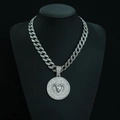 Macro detail of Aries zodiac pendant with crystal paving and silver Cuban chain link - Aries with 18inch Cuban Chain / Silver