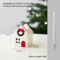Mini ceramic white Christmas house candle holder with red door and festive wreath detail - Small Size Candlestick