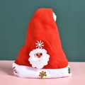 Red plush Christmas hat featuring a cartoon Santa Claus and shiny sequin snowflakes - Adult Cartoon Hat (Santa Claus)