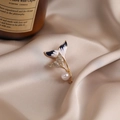 Elegant gold whale tail brooch with navy enamel, rhinestones and pearl on silk fabric - 539# Pisces