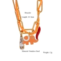 Detail eines bunten geflochtenen Edelstahlarmbands mit Elefanten- und Pfefferanhängern - Armband / Orangefarbenes Armband (Style 6)