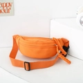 Vibrant orange nylon kids chest bag with adjustable strap and woven zipper pullers - Orange