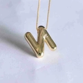 Polished golden bubble letter N pendant with a slim necklace chain for women - Letter N