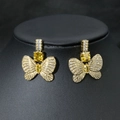 Eleganti orecchini a farfalla dorati con pietre gialle e pavé di zirconi su supporto - Oro/Zirconia Gialla