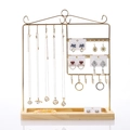 Golden iron jewelry organizer with wooden base for earrings and necklaces display - Gold