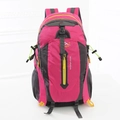 Large rose red and dark grey hiking backpack with yellow zipper pulls and mesh pockets - Pink