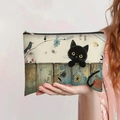 Large capacity canvas pencil pouch featuring a cute black cat and floral illustration - Black Cat on Fence Style