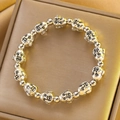Silver Buddha charm bracelet with 13 detailed beads in a premium gold gift box - Silver Buddha Head Beaded Bracelet (X751)