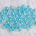 Iridescent light blue acrylic round beads for DIY jewelry making on white plush background - Transparent Light Blue AB