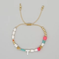 Adjustable evil eye charm bracelet with pink bead, pearl, and gold T-letter pendant - Letter T Multi-element Bracelet (ZZ-B24061901T-F)