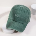 Vintage washed green baseball cap with white The Future embroidery on a minimalist stand - Dark Green
