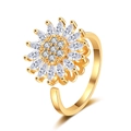 Macro shot of rotatable sunflower ring with sparkling marquise zircon petals in gold - Gold Sunflower Rotating