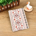 Ethnic geometric pattern spiral notebook with orange and brown diamond motifs - A5 / Bohemian Style 2