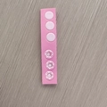 Pink and white baby shampoo cap with adjustable snap buttons for ear protection - Strap Extender Pink