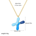 Gold necklace with a blue balloon-style letter X pendant and dimension markings - Letter X