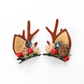 Pair of brown reindeer antler hair clips with pine cones and festive berries on white background - Christmas Reindeer Antler Hair Clip Style G