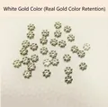 Detailed macro view of white gold plated snowflake beads for jewelry making DIY - 4mm Hole 1.2mm / Platinum Plated