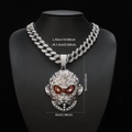 Silver iced out monkey king pendant on a thick cuban chain with detailed size markings - Necklace / Silver