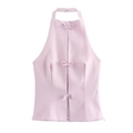 Pink halter neck top with sweet bow decorations and tie-back design in a flat lay view - S / Pink